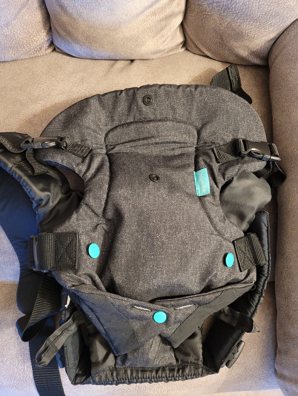 Black Carrier with Teal Accent Buttons